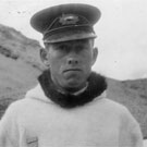 Portrait of Tommy, an Inuit man who received a medal for life-saving, Kimmirut (formerly Lake Harbour), Nunavut, 1945