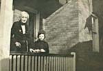 Photograph of Glenn Gould and his grandmother, standing on the porch