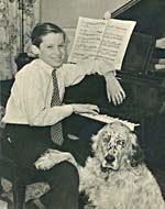 Photograph of Glenn Gould at the piano, with his dog and his budgie, c. 1944