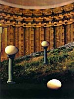 Collage of eggs on pillars in front of a building, by Joan McCrimmon Hebb